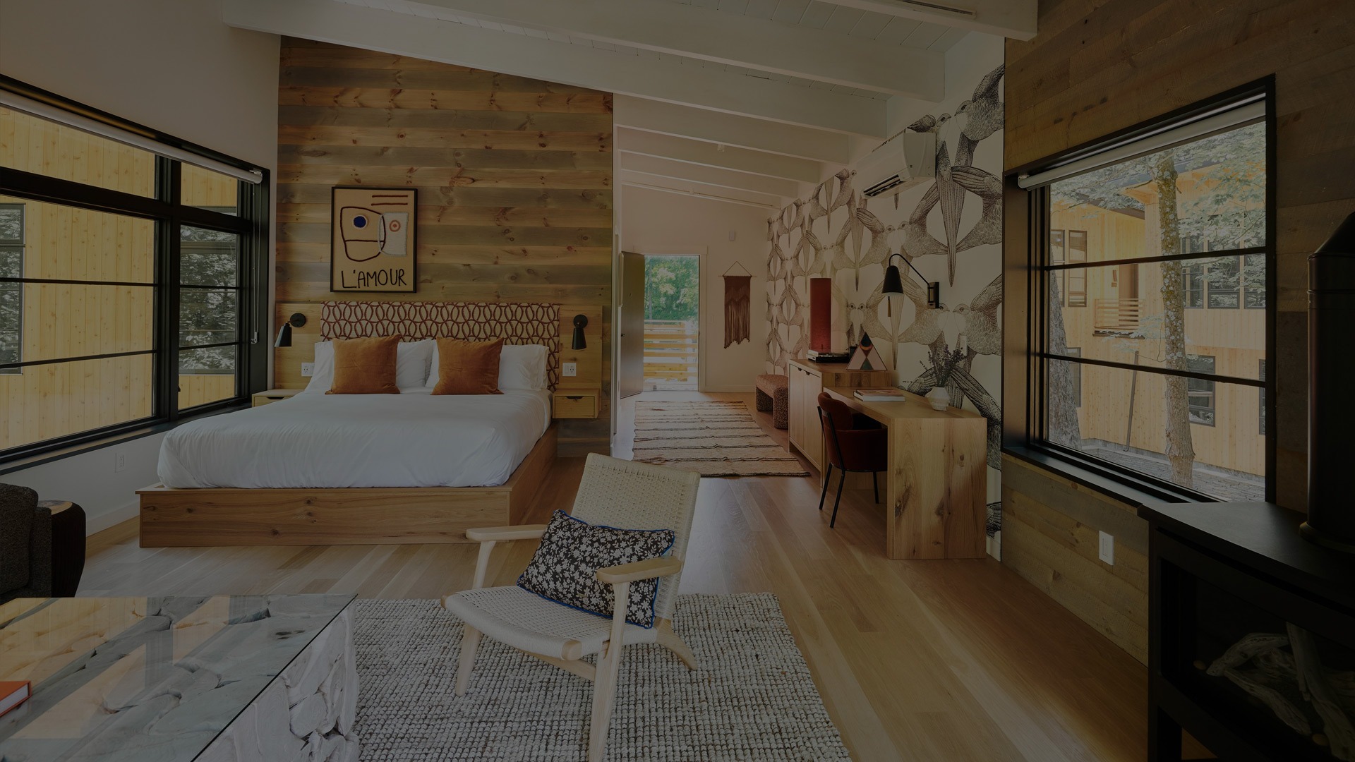 Guest bedroom and chairs at Woodstock Way Hotel