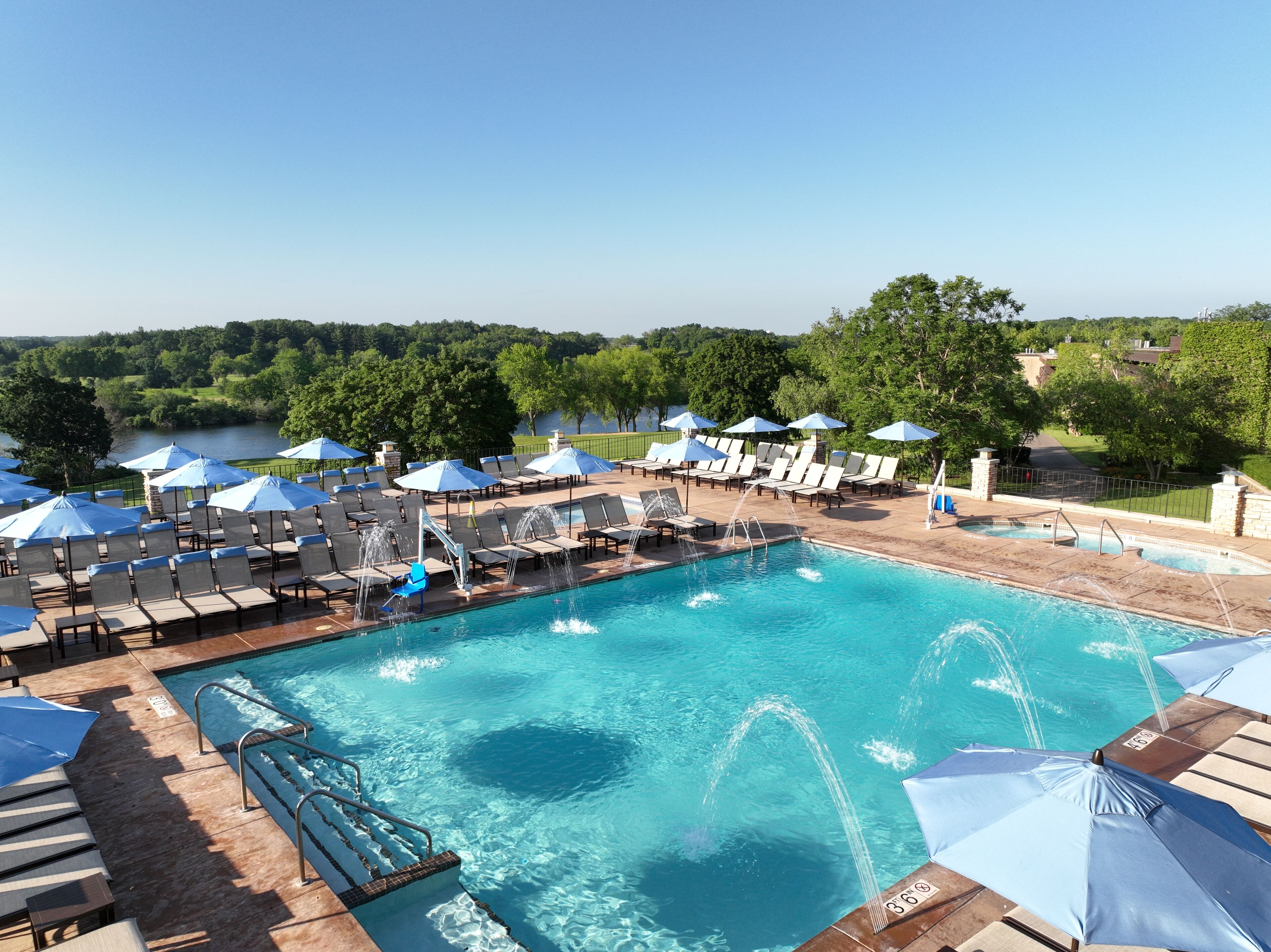 Grand Geneva shared outdoor pool and landscaped resort setting