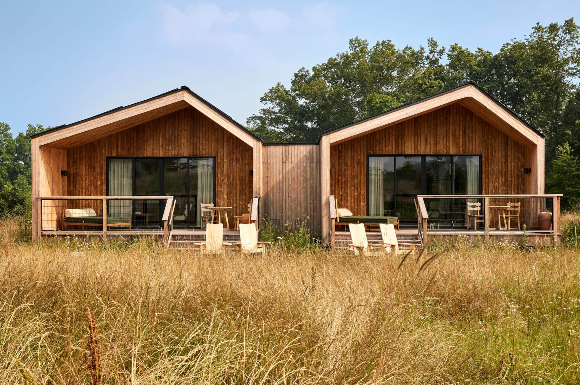 Wildflower Farms cottages beside a meadow
