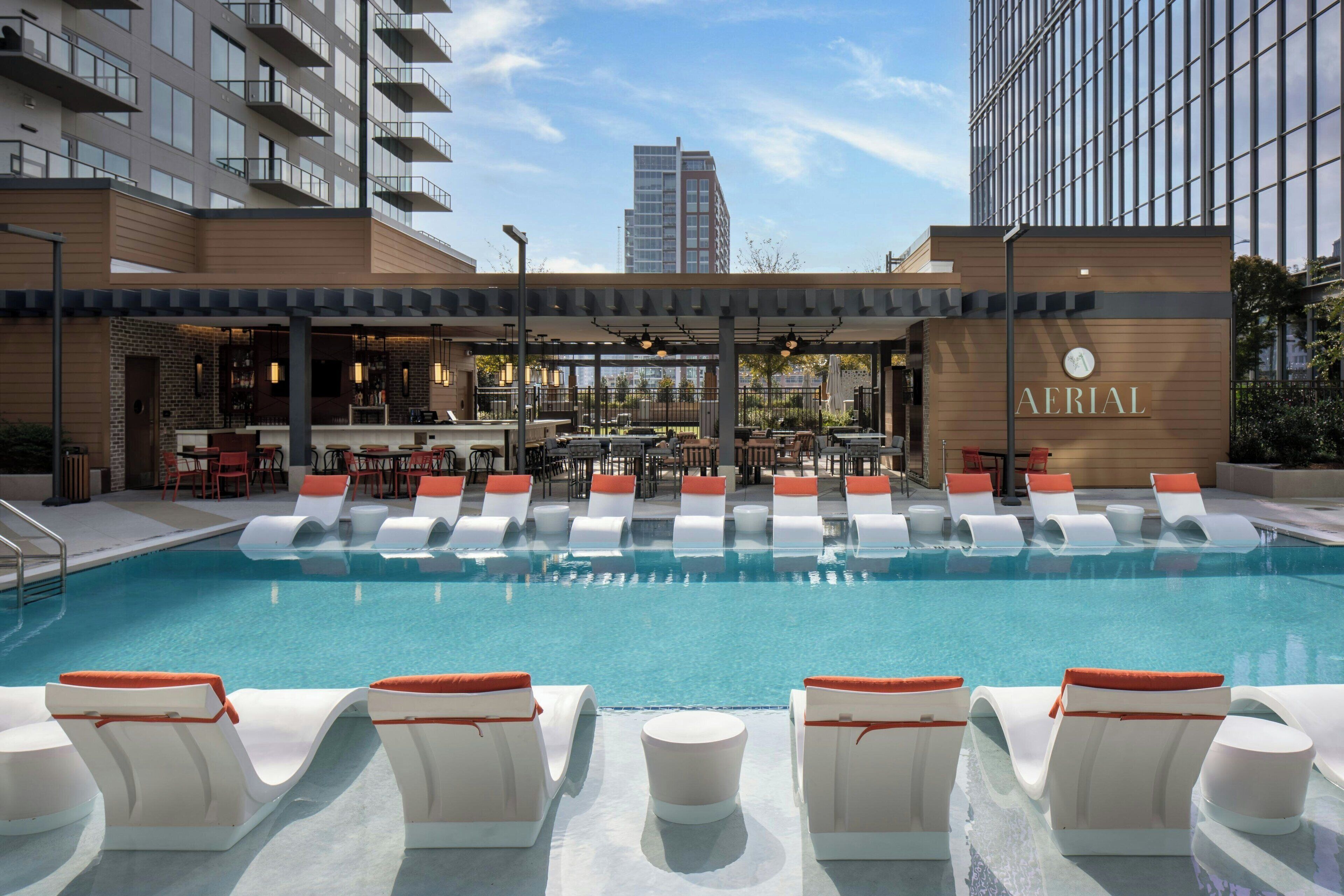 Shared rooftop pool and loungers at Epicurean Atlanta