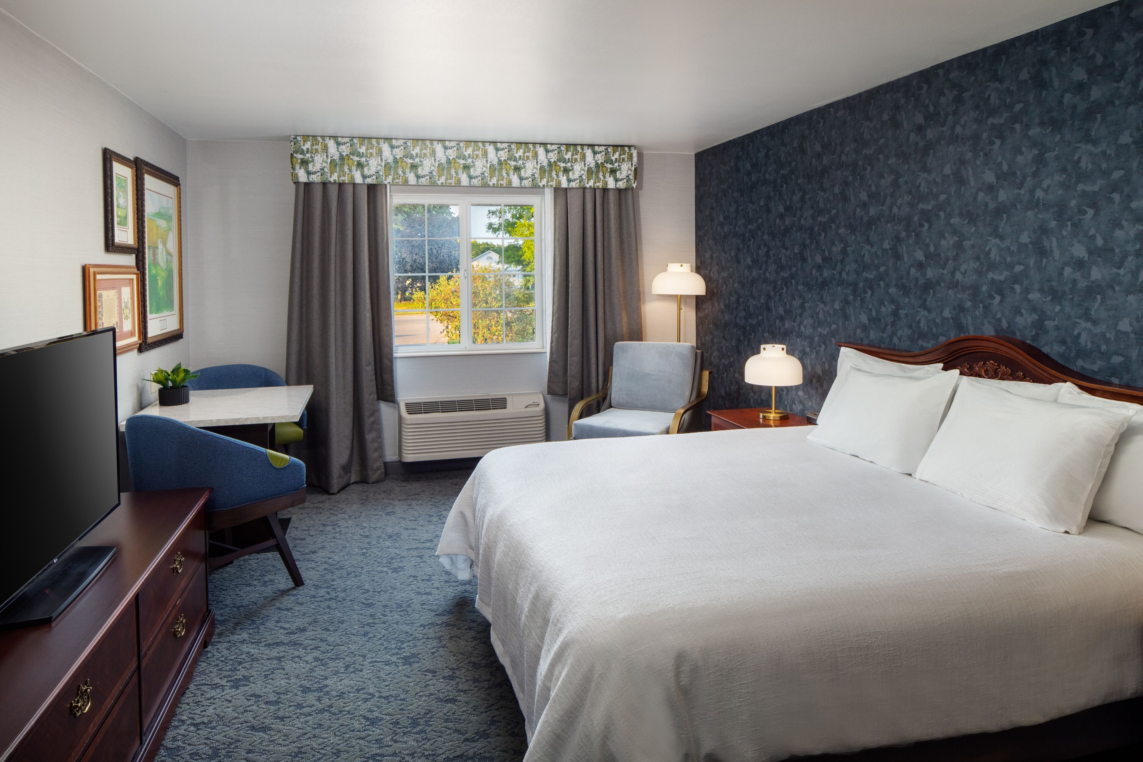 Traditional king guestroom at Irish Cottage Inn; private Jacuzzi not implied