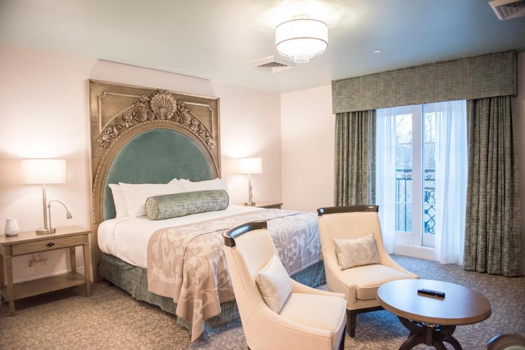 King bedroom with Juliet balcony at Mirbeau Rhinebeck