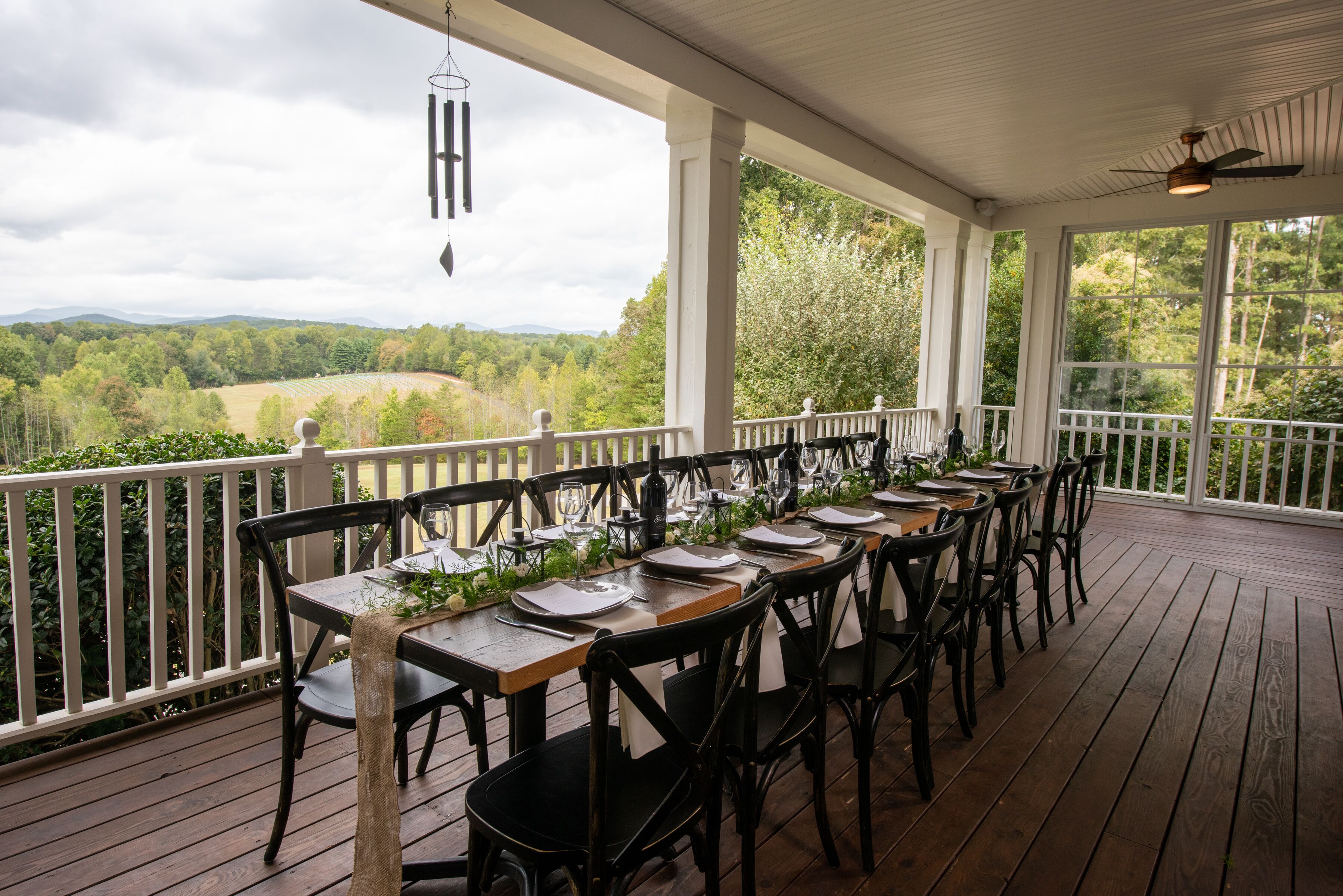 Covered dining terrace overlooking the countryside at Dahlonega Resort and Vineyard