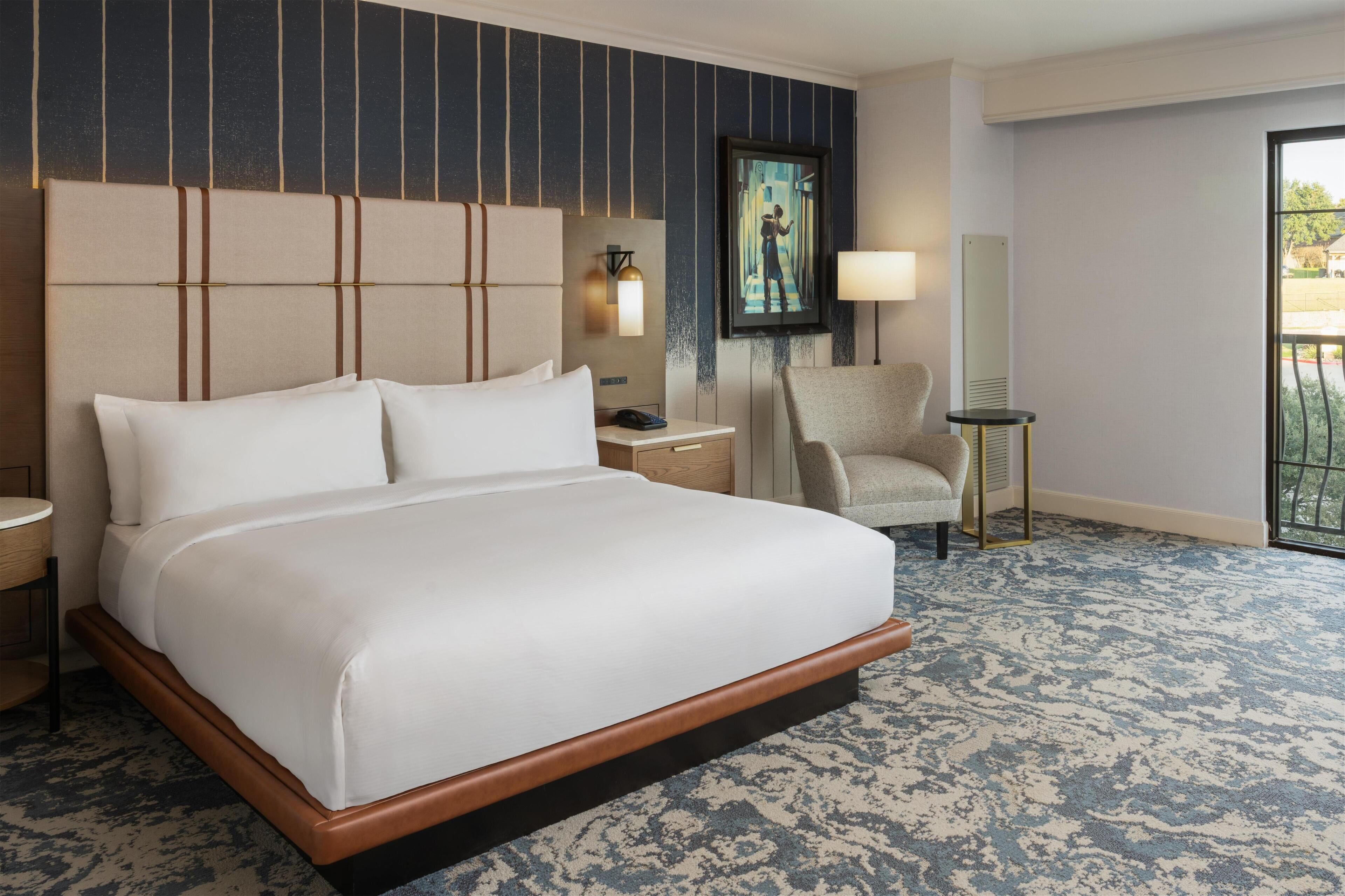 Accessible king category at Hilton Rockwall; bathroom layouts vary