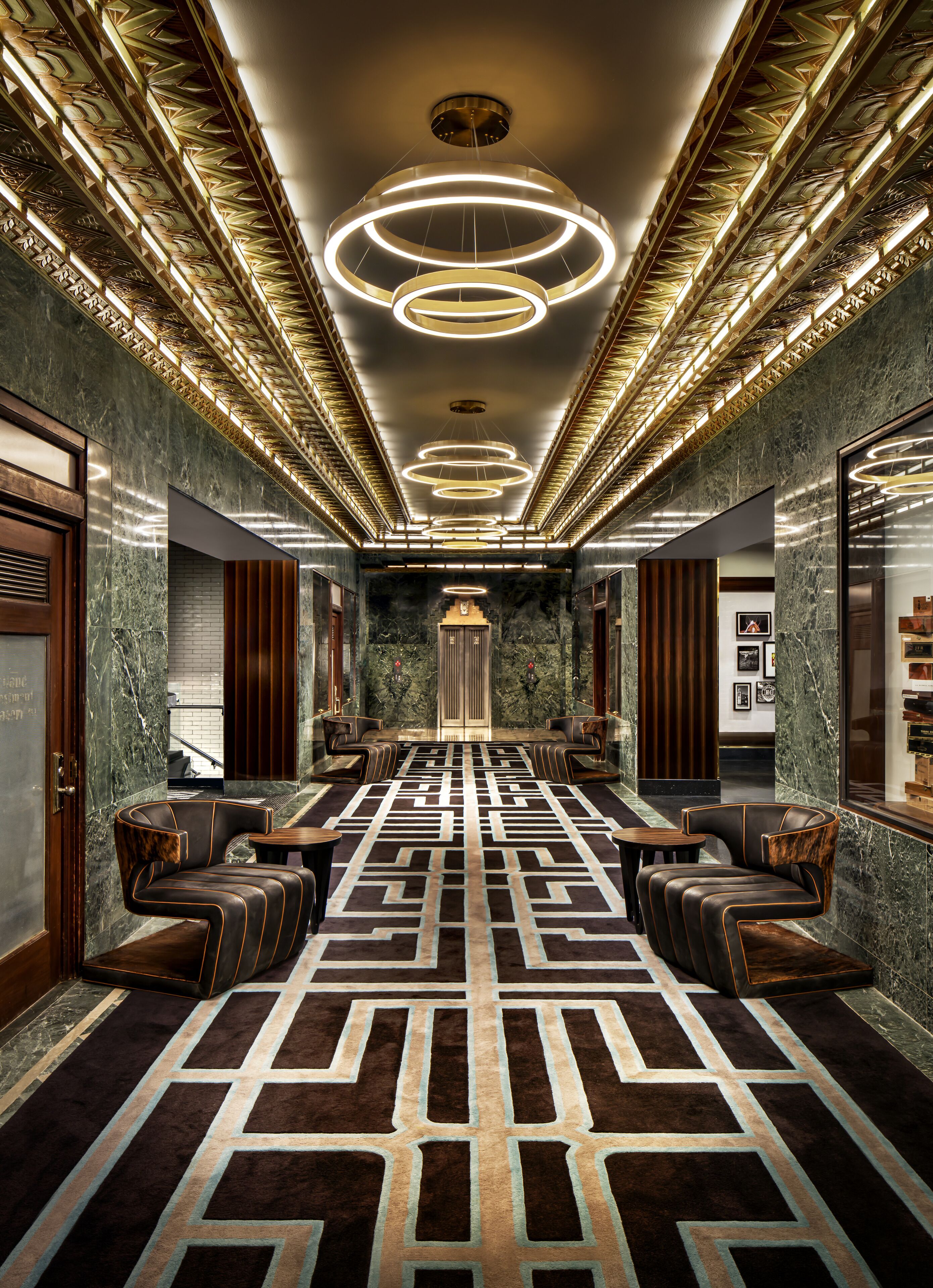 The Sinclair’s lobby with geometric flooring and contemporary lighting