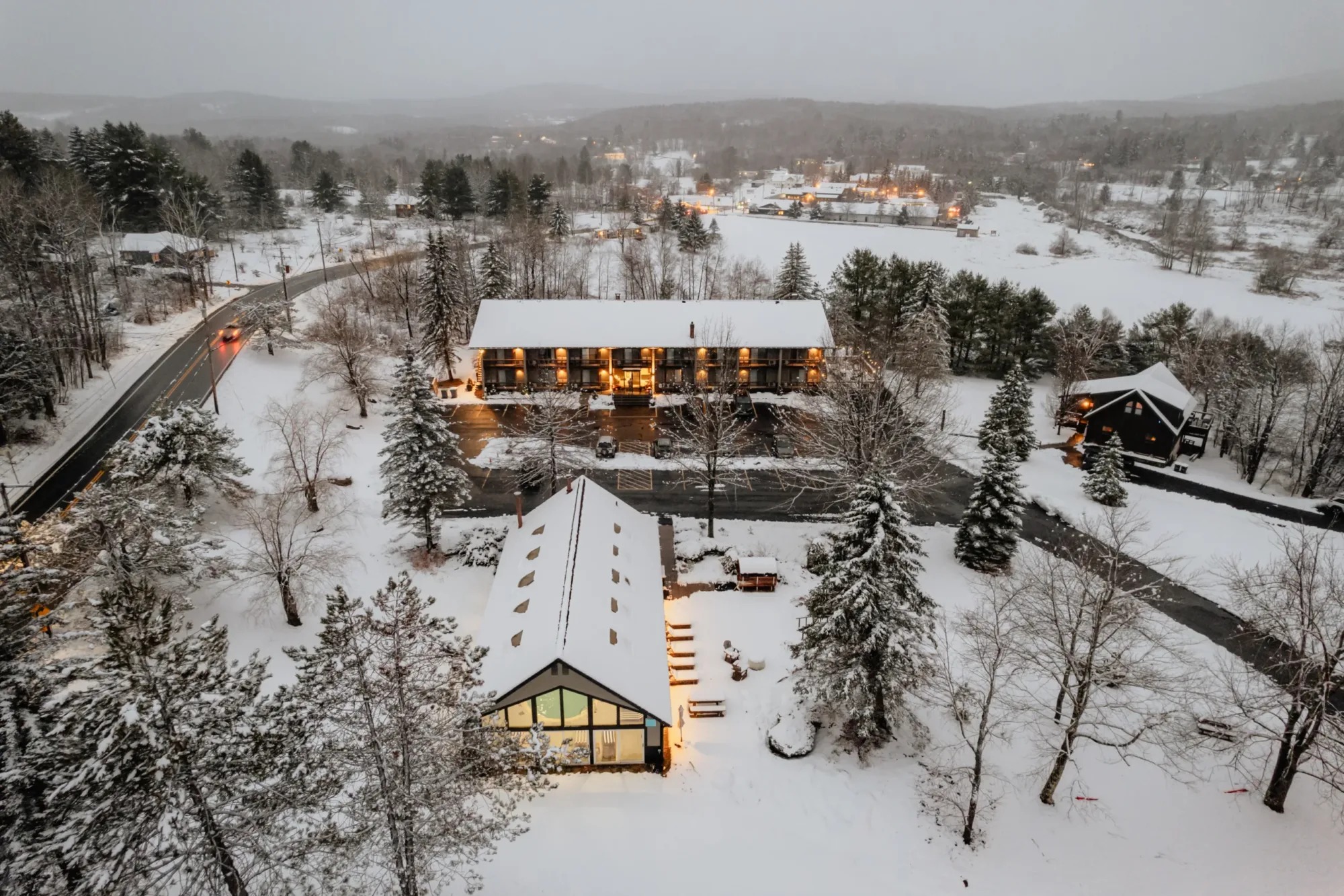 Snow-covered Hotel Vienna buildings in Windham